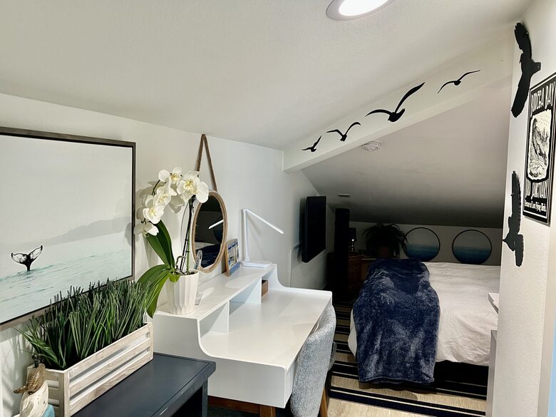 Entrance to guest suite with low sloped ceilings.