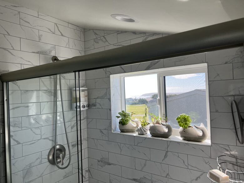 View from detached bedroom en-suite bathroom shower.