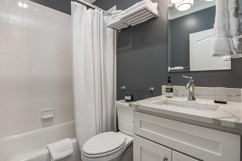Upstairs hallway bath that supports upstairs queen too