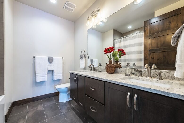 Second master suite bath with soaking tub and dual vanity