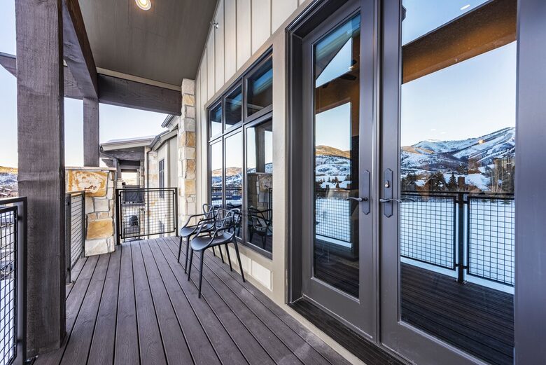 Deck with view of the golf course and mountain resort