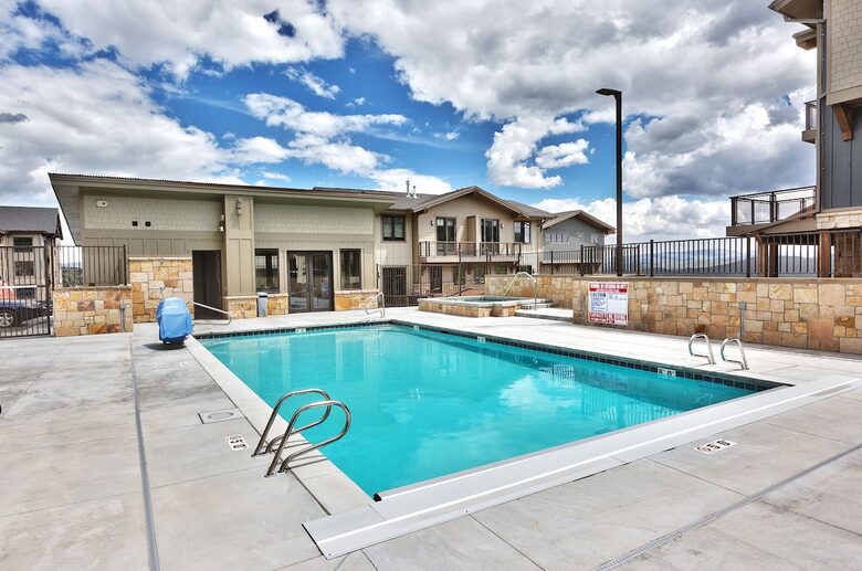 Year-around heated pool and hot tub by Club House and gym