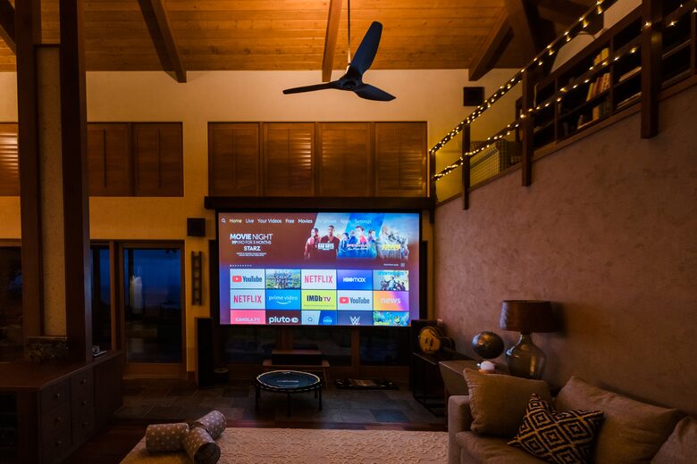 Very large drop down screen w/HiDef projector and surround sound.