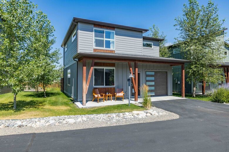 Front of house with small porch for morning coffee