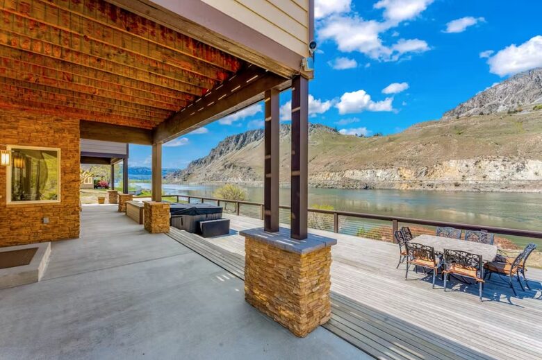 Hot tub, firepit, dining area and BBQ on the back deck