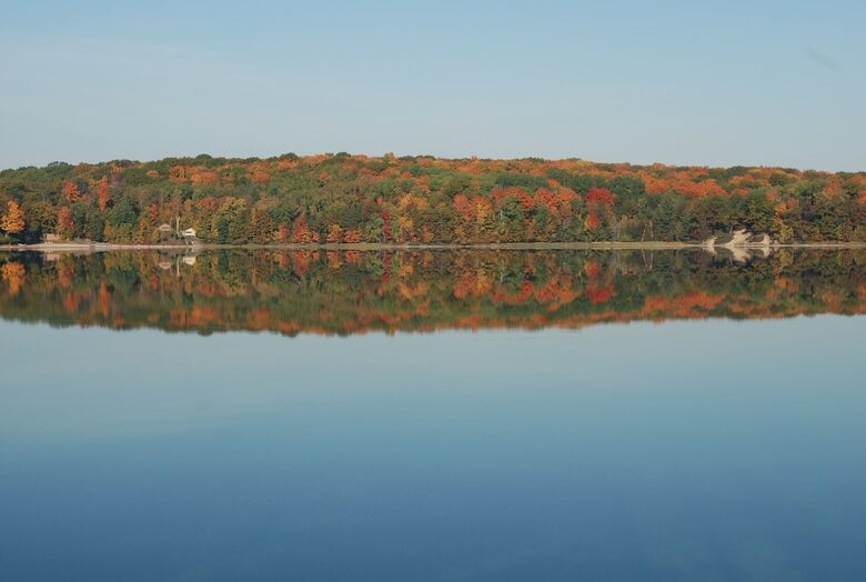 Luxury Lakefront Cottage | With Sandy Beach, Hot Tub, SUP, & Dock - Traverse City, Michigan