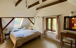Upstairs master bedroom with gorgeous view of forest, fields