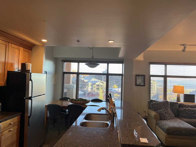 Family oriented kitchen with picture windows facing the forum.