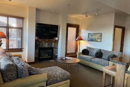 Living room with walk out balcony and memory foam sleep sofa