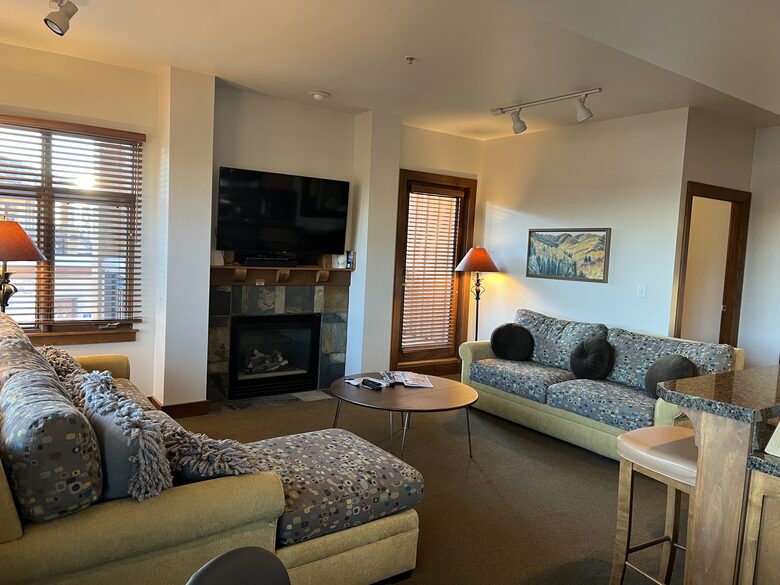 Living room with walk out balcony and memory foam sleep sofa