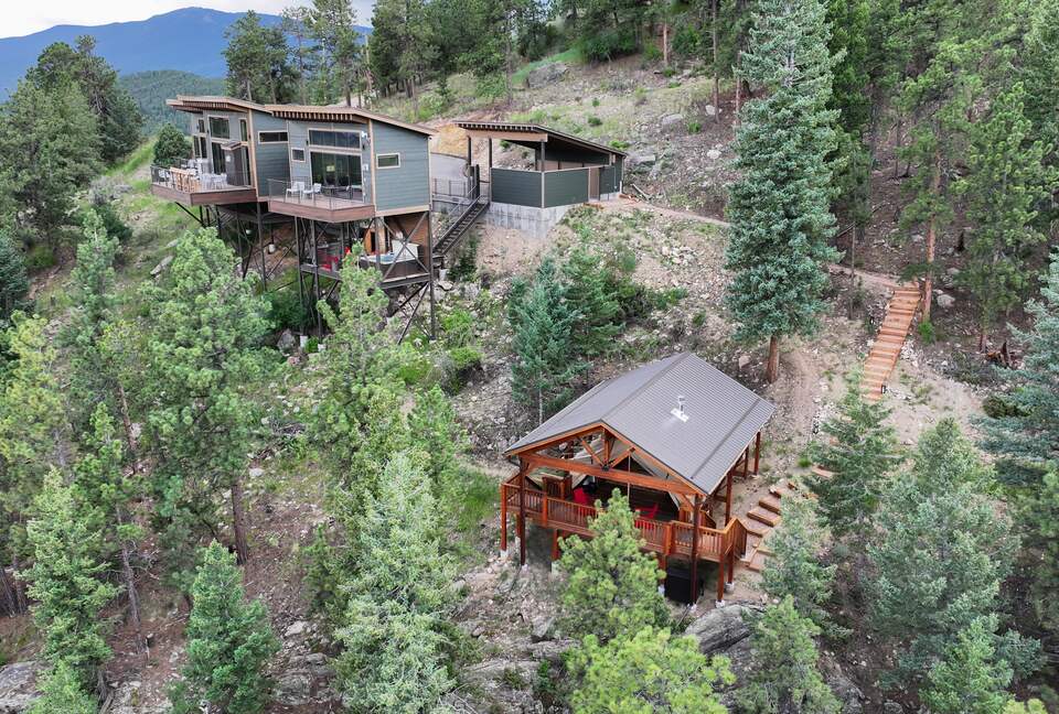 Aerial view of the Zen Treehouse, car port,& Glamping Tent