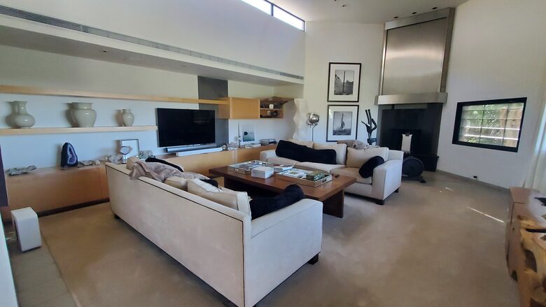 Family Room with TV, Fire Place and Fountain