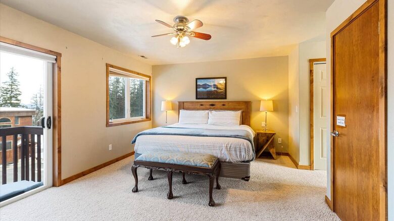The master bedroom features a small balcony and an office area