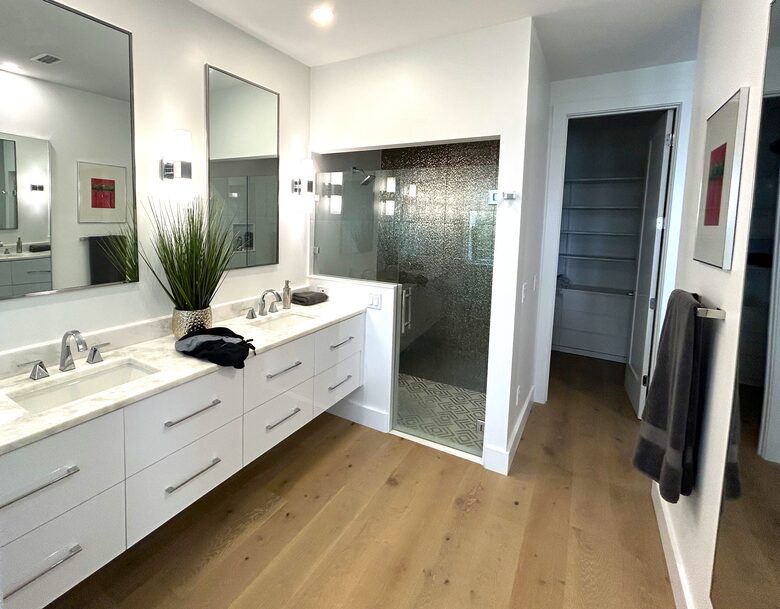 Primary En Suite Bath w/ Luxe Rainfall 2 hd Shower & 2 sinks