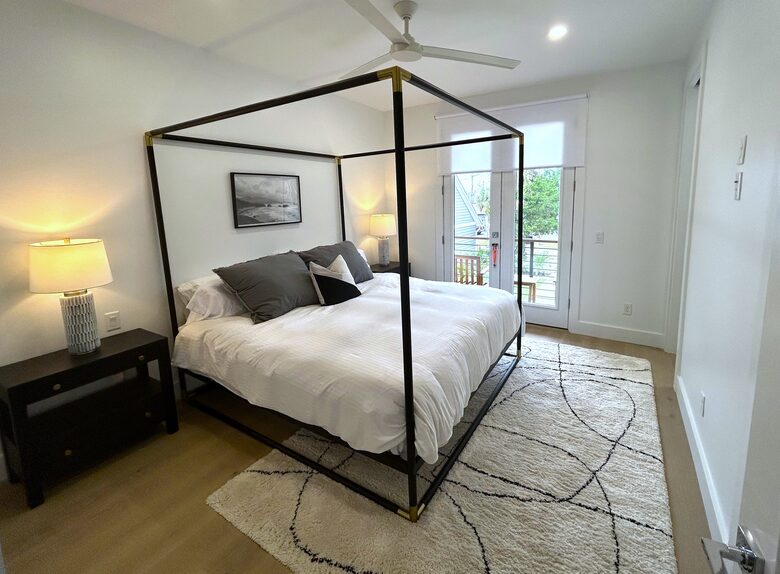 Bedroom 2 with King Canopy Bed and private west facing deck
