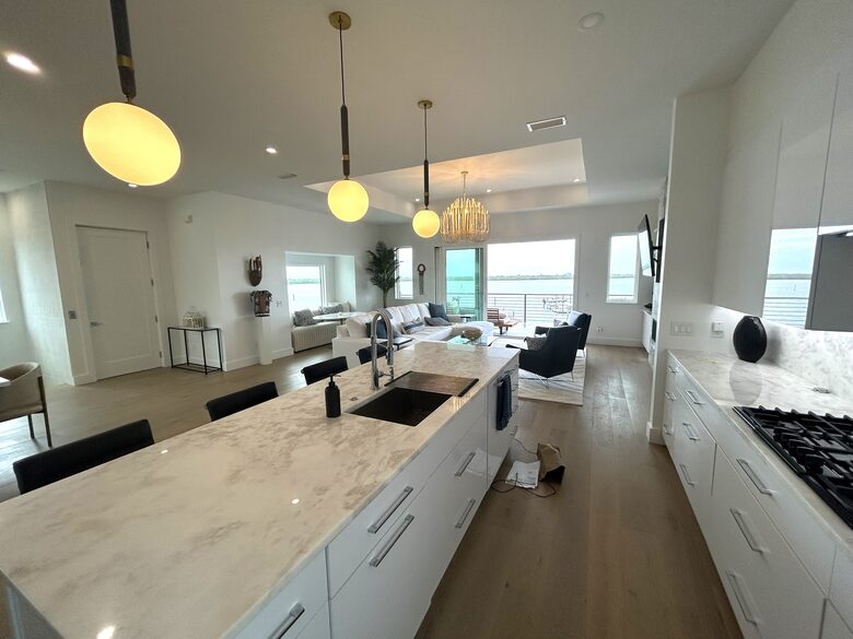 Chef's Kitchen with Marble counter and counter seating for 4
