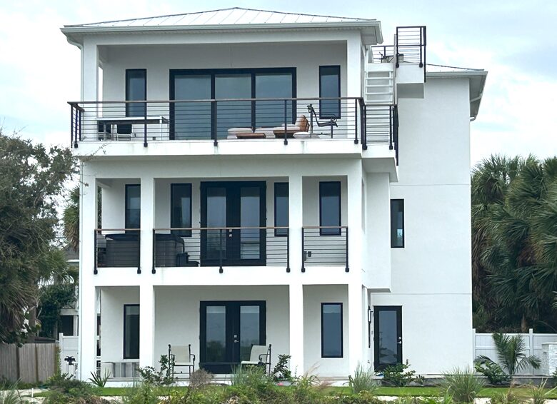 Water side showing 4 decks including rooftop viewing deck