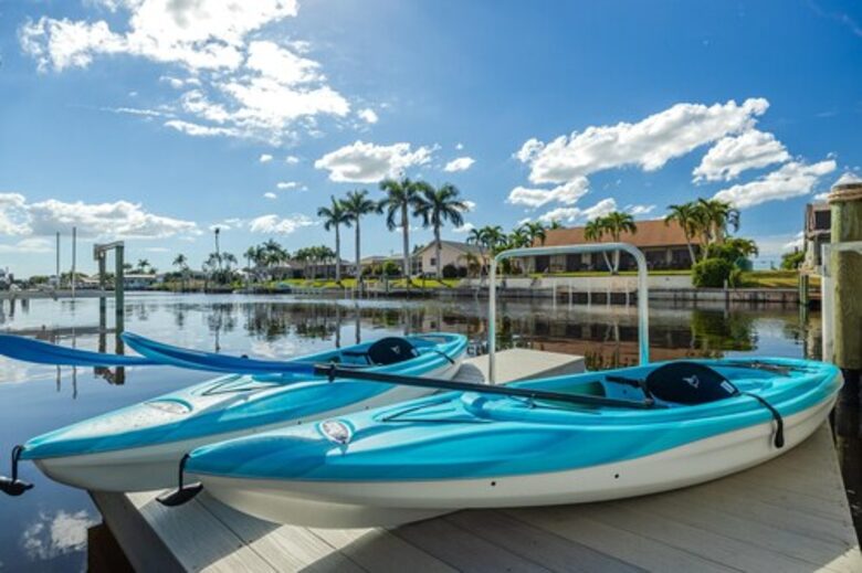 Resort Style Retreat | Gulf Access, Heated Pool & Spa, Boat Dock, Private Beach, Tiki Hut - Cape Coral, Florida