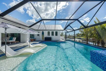 Resort Style Retreat | Gulf Access, Heated Pool & Spa, Boat Dock, Private Beach, Tiki Hut - Cape Coral, Florida