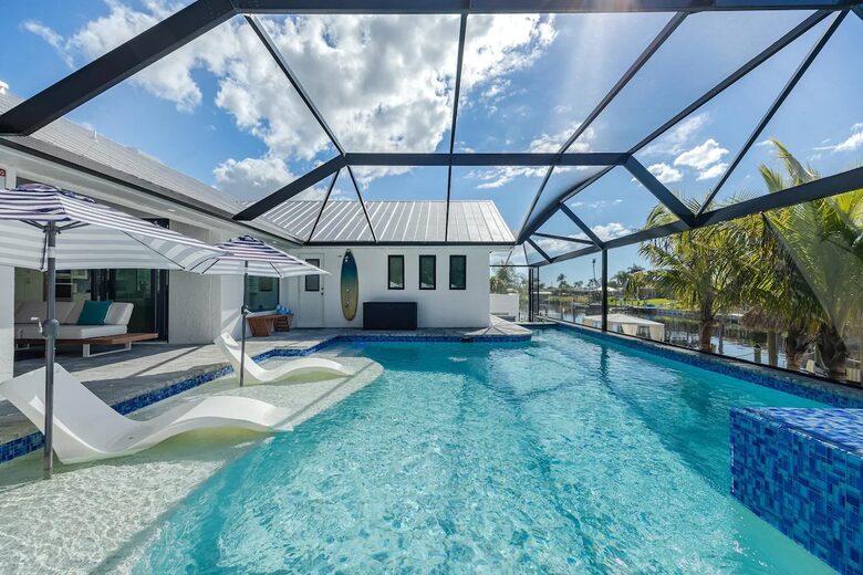Resort Style Retreat | Gulf Access, Heated Pool & Spa, Boat Dock, Private Beach, Tiki Hut - Cape Coral, Florida