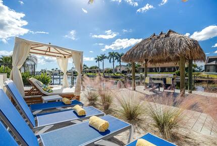 Resort Style Retreat | Gulf Access, Heated Pool & Spa, Boat Dock, Private Beach, Tiki Hut - Cape Coral, Florida