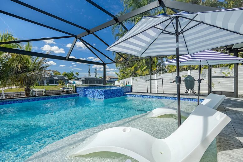 Resort Style Retreat | Gulf Access, Heated Pool & Spa, Boat Dock, Private Beach, Tiki Hut - Cape Coral, Florida