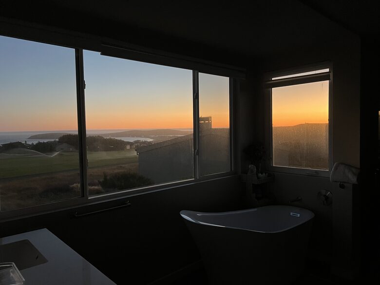 Primary bathroom at sunset.