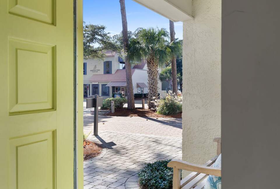 Front door.  Walk acorss road to the harbour, shops and restaurants