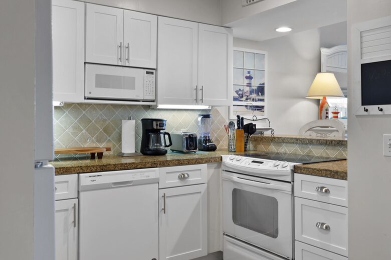 Fully equipped kitchen with views out to the water