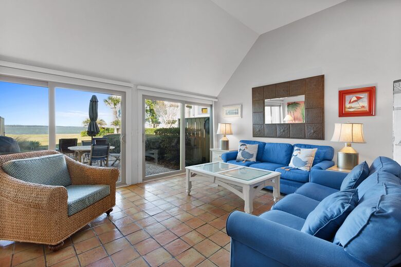 sofa sleeper, sofa and two chairs for ample seating