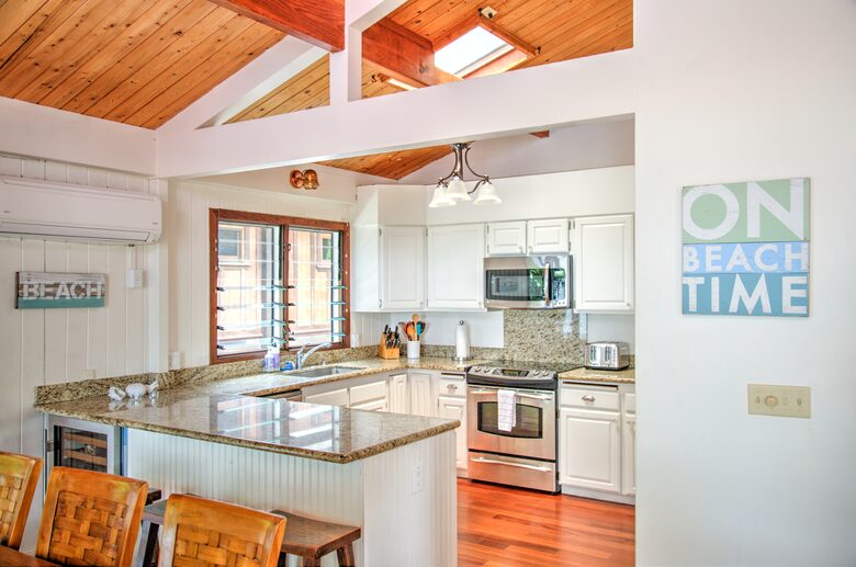 Fully stocked kitchen w/ sub-zero fridge and sub-zero wine fridge.