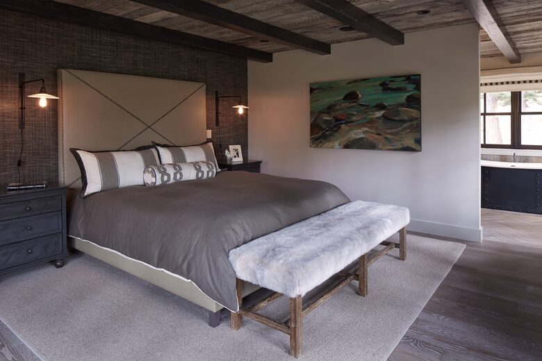 Primary bedroom with views over creek and large bath
