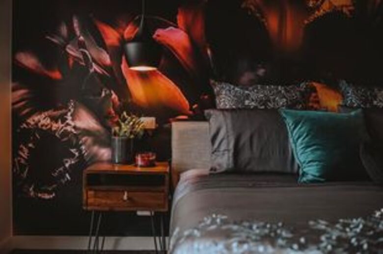 Master bedroom with vibrant wall mural and quality manchester