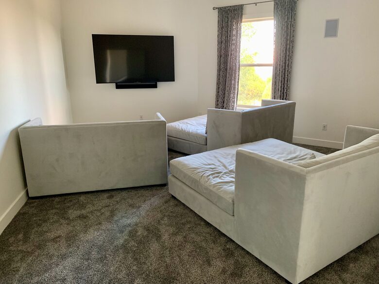 Media Room with queen size chase lounges (extra sleeping room)
