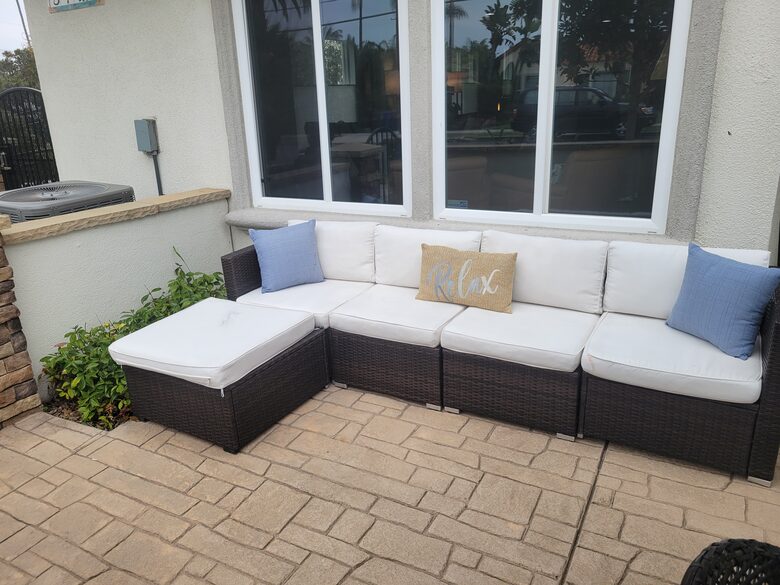 Lanai with patio furniture and umbrella