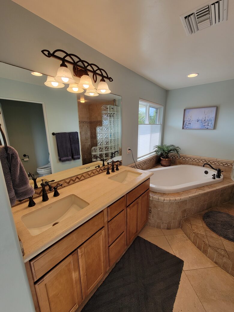 Master bath with tub, shower, and bidet in water closet