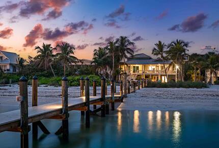 Latitude Adjustment- Beachfront with an Amazing Lit Private Fishing Dock w/ Sunrise Views - North Captiva, Florida