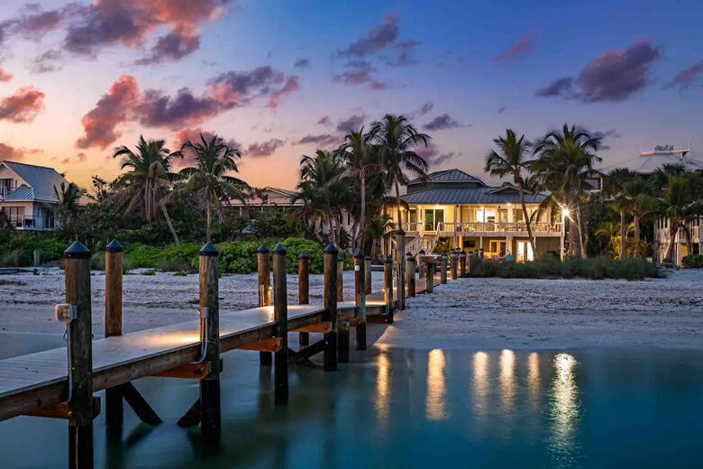 Latitude Adjustment- Beachfront with an Amazing Lit Private Fishing Dock w/ Sunrise Views - North Captiva, Florida