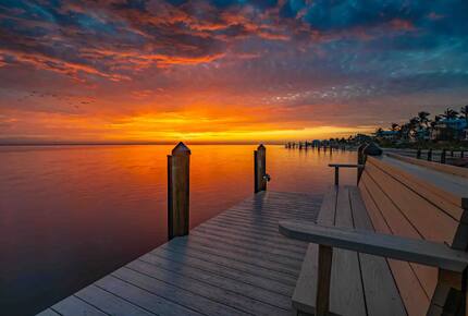 Latitude Adjustment- Beachfront with an Amazing Lit Private Fishing Dock w/ Sunrise Views - North Captiva, Florida