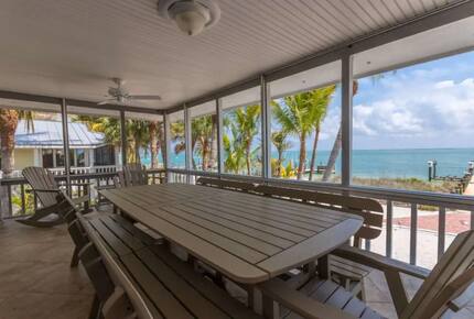 Latitude Adjustment- Beachfront with an Amazing Lit Private Fishing Dock w/ Sunrise Views - North Captiva, Florida