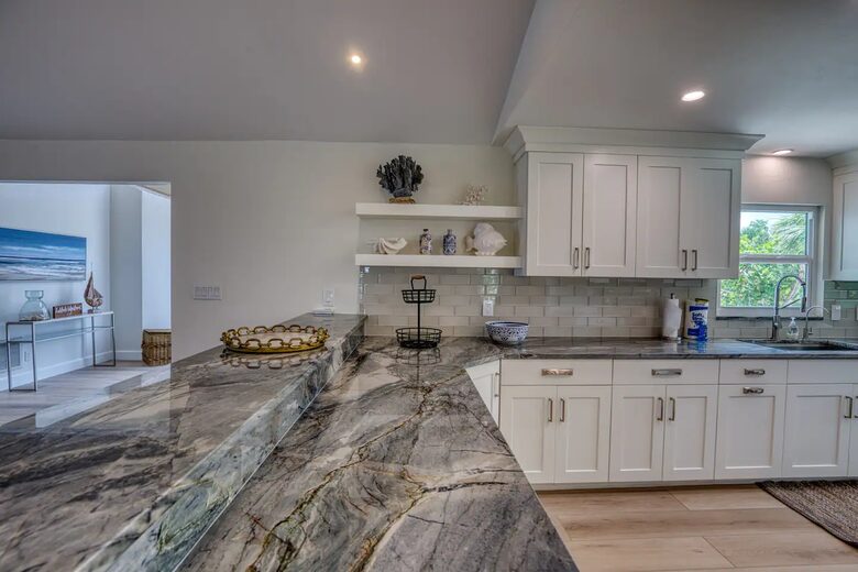 Latitude Adjustment- Beachfront with an Amazing Lit Private Fishing Dock w/ Sunrise Views - North Captiva, Florida