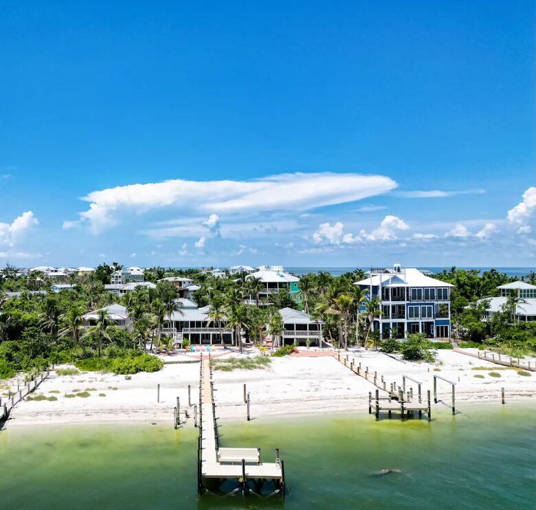 Latitude Adjustment- Beachfront with an Amazing Lit Private Fishing Dock w/ Sunrise Views - North Captiva, Florida