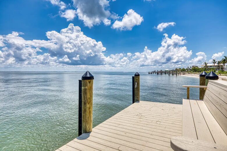 Latitude Adjustment- Beachfront with an Amazing Lit Private Fishing Dock w/ Sunrise Views - North Captiva, Florida