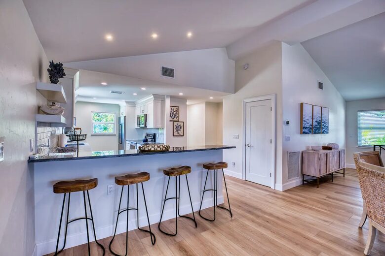 Latitude Adjustment- Beachfront with an Amazing Lit Private Fishing Dock w/ Sunrise Views - North Captiva, Florida