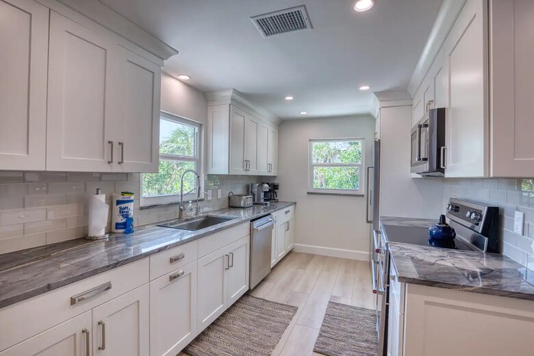 Latitude Adjustment- Beachfront with an Amazing Lit Private Fishing Dock w/ Sunrise Views - North Captiva, Florida