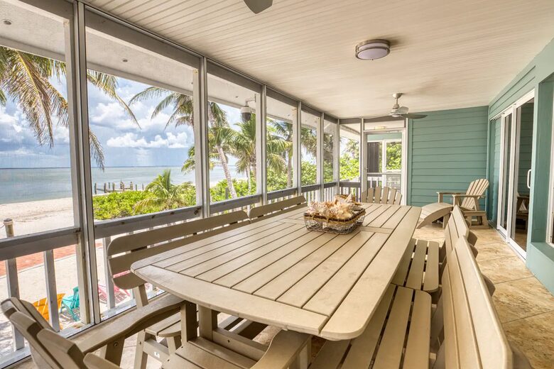 Latitude Adjustment- Beachfront with an Amazing Lit Private Fishing Dock w/ Sunrise Views - North Captiva, Florida