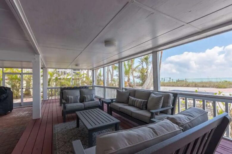 Latitude Adjustment- Beachfront with an Amazing Lit Private Fishing Dock w/ Sunrise Views - North Captiva, Florida