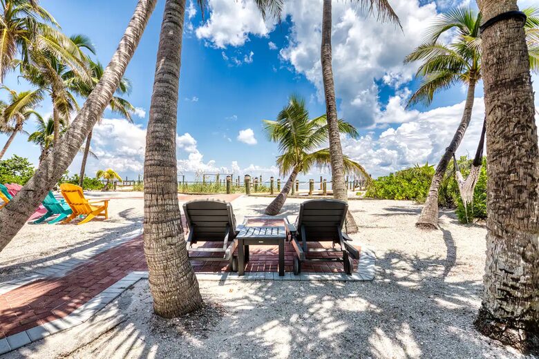 Latitude Adjustment- Beachfront with an Amazing Lit Private Fishing Dock w/ Sunrise Views - North Captiva, Florida