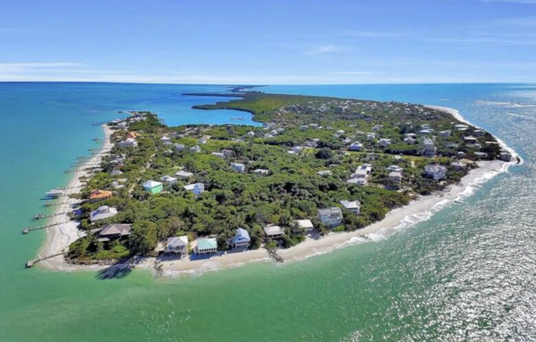 Latitude Adjustment- Beachfront with an Amazing Lit Private Fishing Dock w/ Sunrise Views - North Captiva, Florida