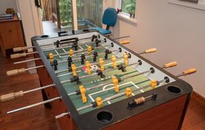 Have some fun playing foosball
